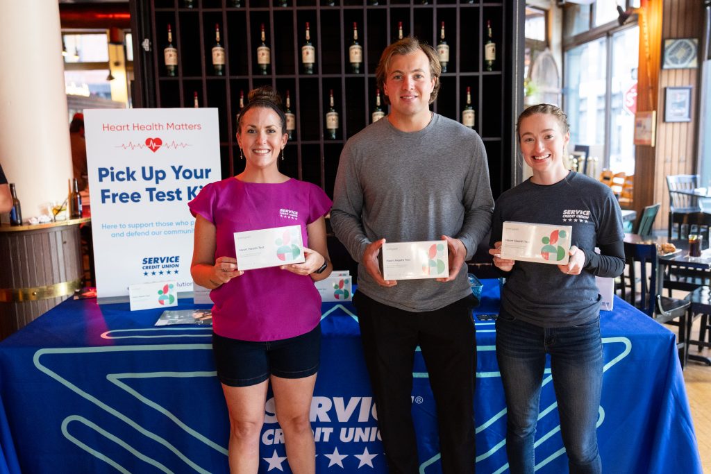 Three people at Service Credit Union