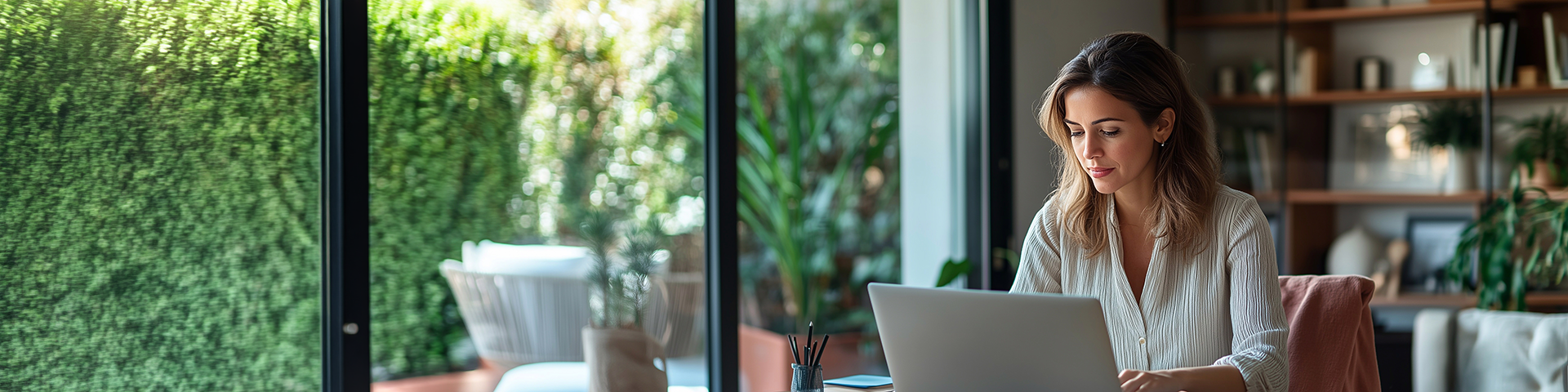 Woman accessing forms on her laptop