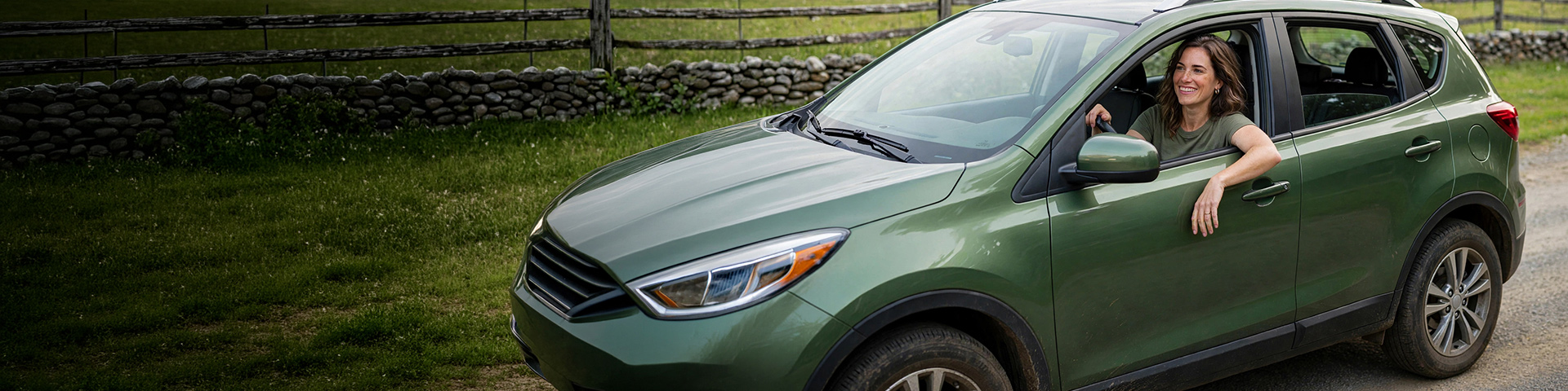 Woman Driving Green Car