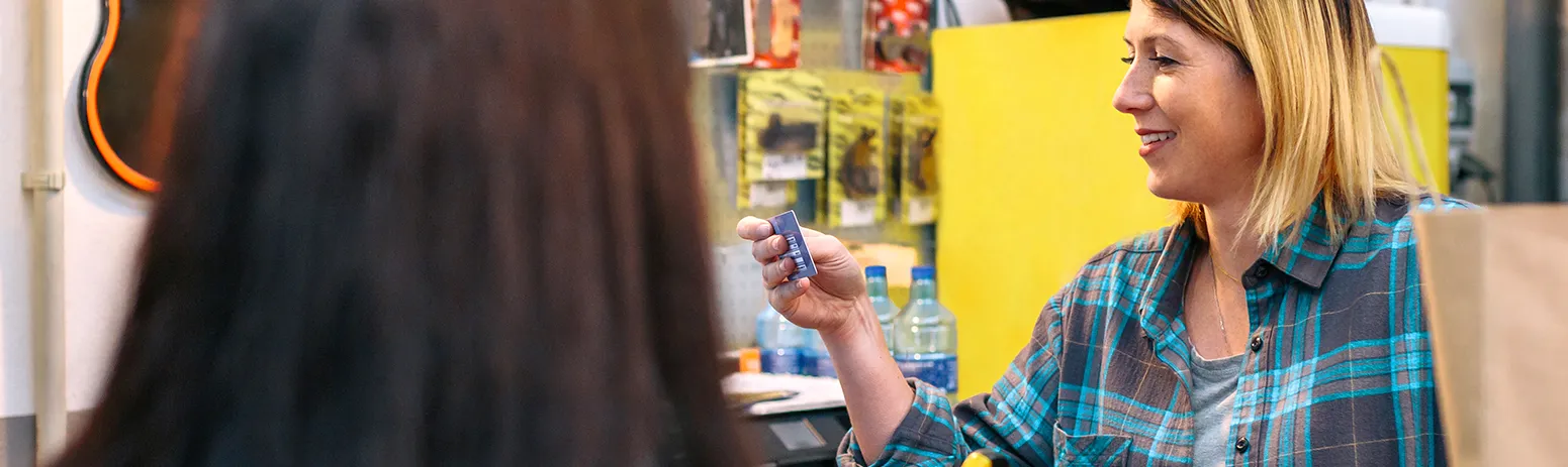 Woman paying with a credit card