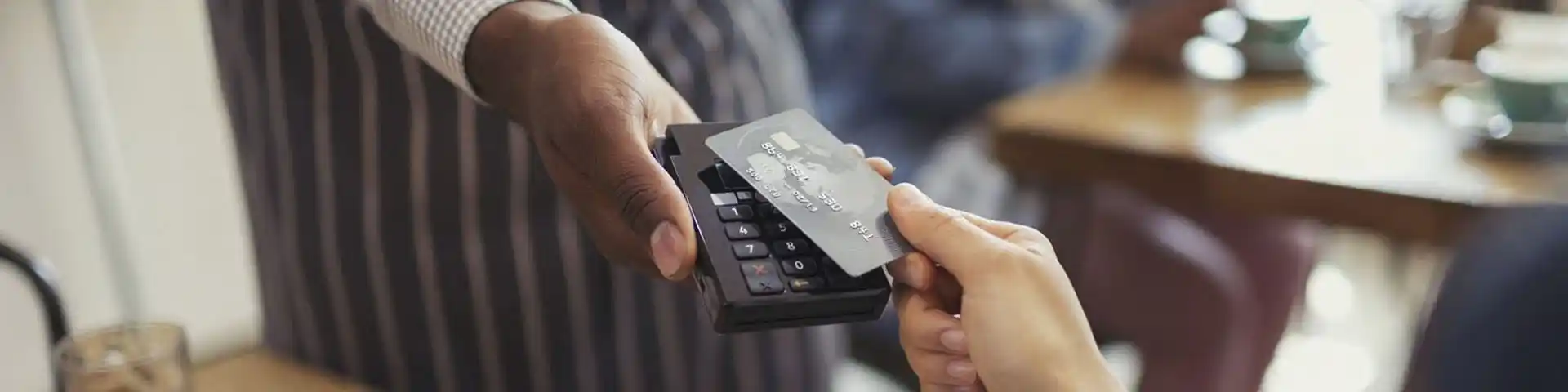 someone using their debit card for a transaction