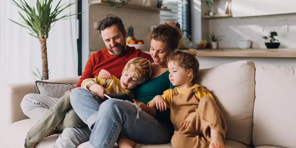 family hanging out on the couch
