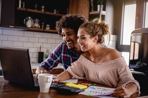 CoupleLookingatLaptop