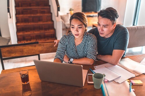 CoupleResearchingOnComputer