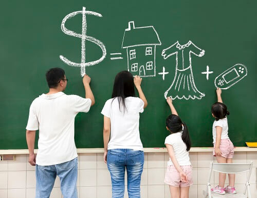 FamilyDrawingOnChalkboard