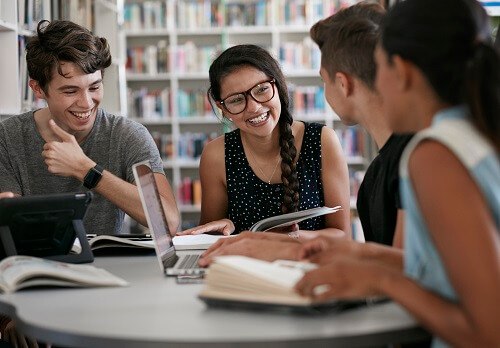 StudentsLaughingInLibrary