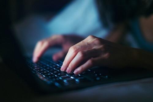 TypingonLaptop