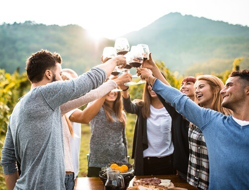 VacationersDrinkingWine