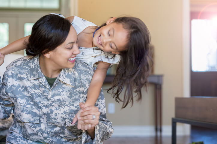 Young-girl-and-her-mother-play-with-one-another